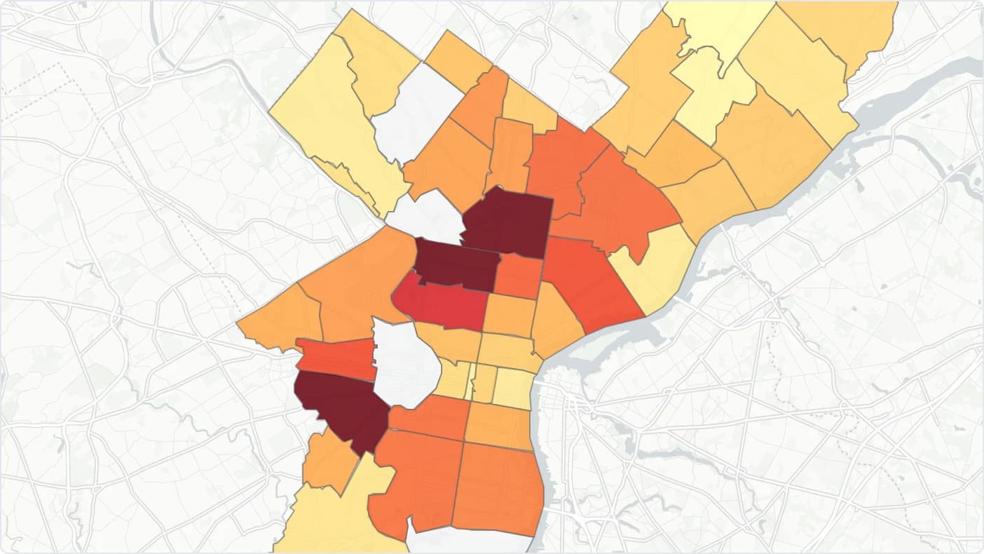 Philadelphia ZIP codes shaded from pale yellow to deep red by block party permit volume.